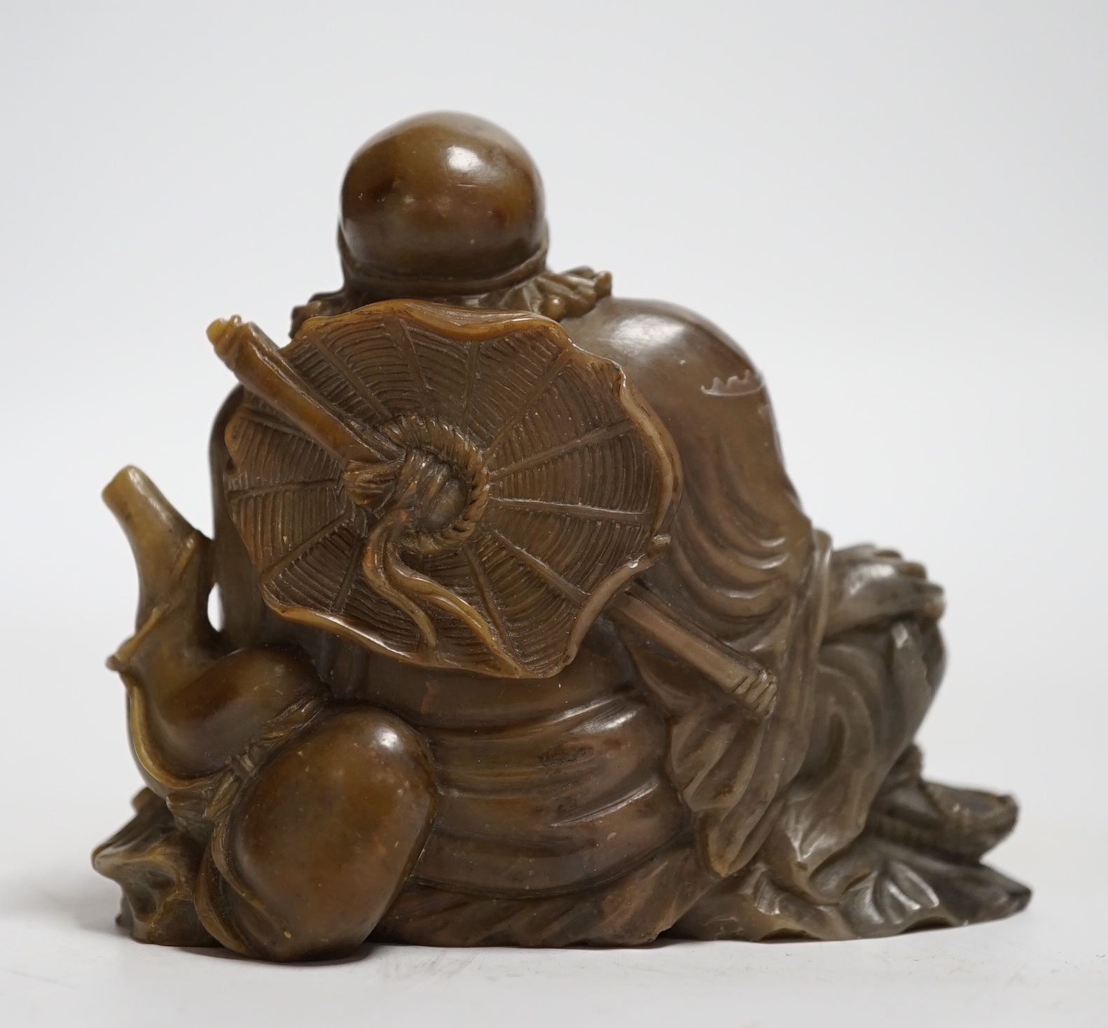 A Chinese soapstone carving of a sage, 7cm wide